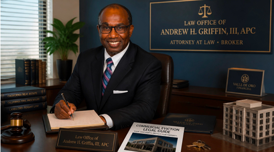 Smiling attorney Andrew H. Griffin, III, APC, is seated at his office desk. Visible text includes his firm's plaque: "LAW OFFICE OF ANDREW H. GRIFFIN, III, APC ATTORNEY AT LAW + BROKER" and a "COMMERCIAL EVICTION LEGAL GUIDE."